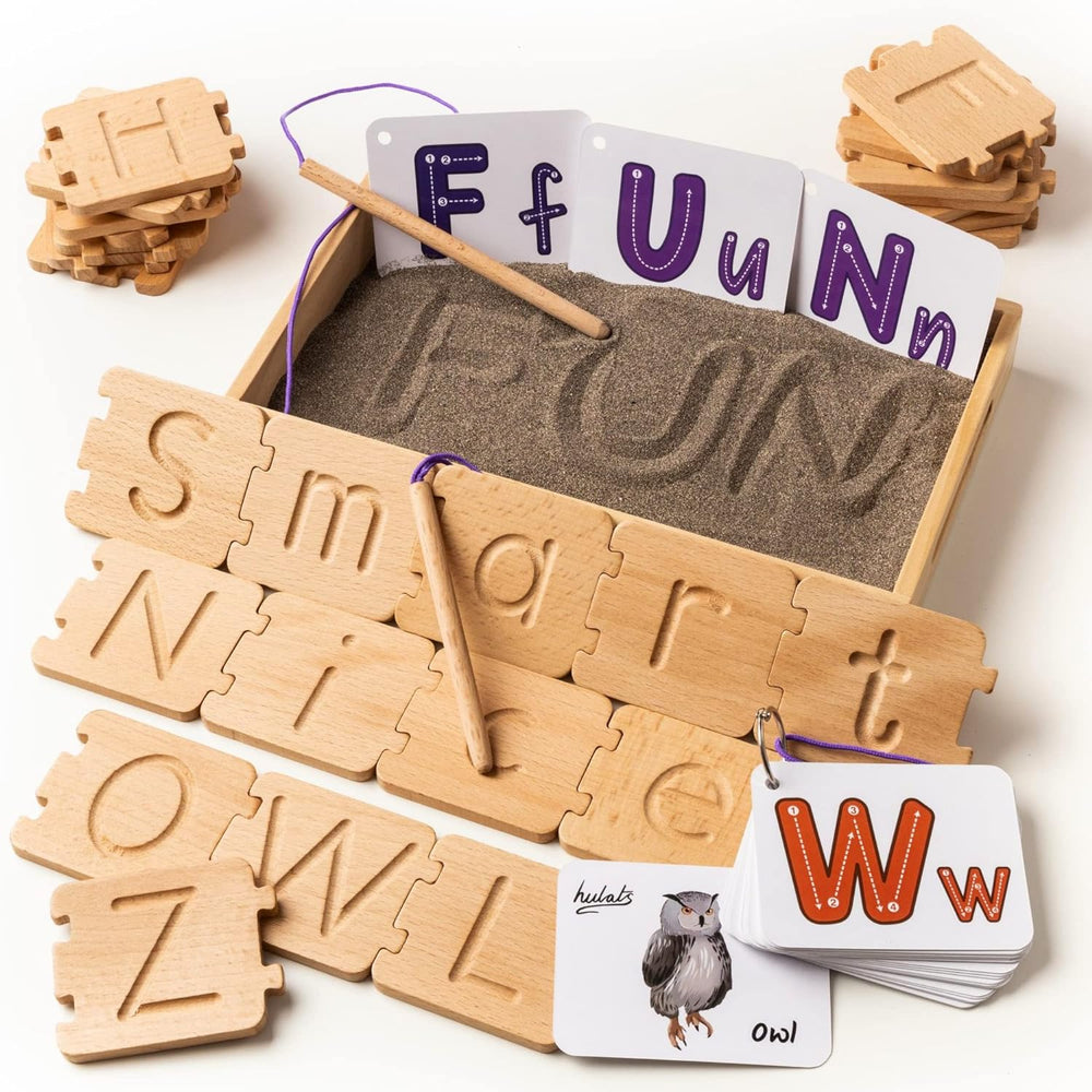 Letter tiles, alphabet cards and the sand tray